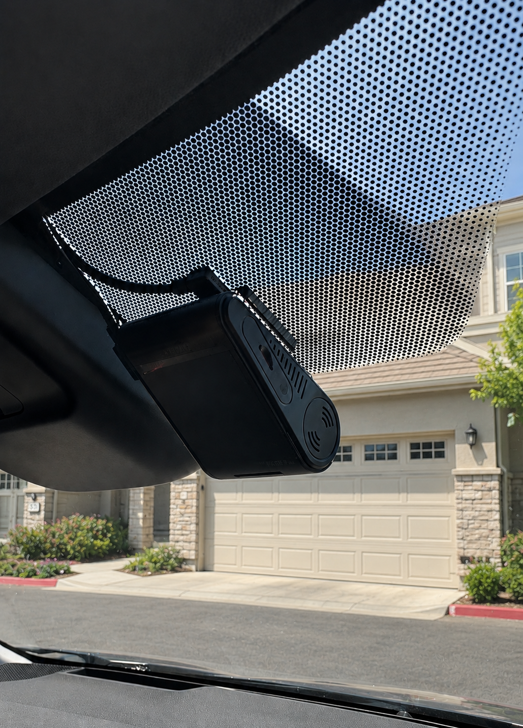 Dash cam hardwired behind the windshield tint strip with wiring fully hidden